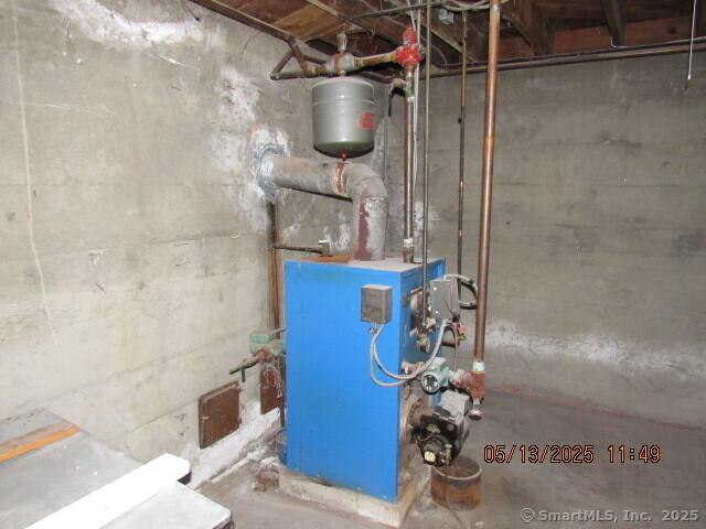 8 Noble Ave, Naugatuck, CT 06770 - utility room featuring a heating unit