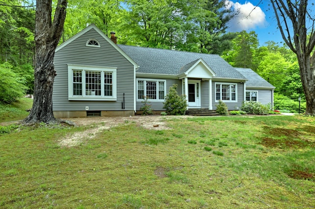 980 Mount Carmel Ave, Hamden, CT 06518 - single story home with a chimney, a front yard, a shingled roof, and view of scattered trees
