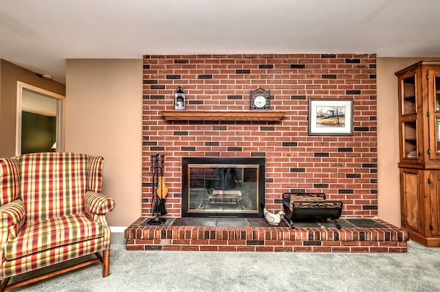 980 Mount Carmel Ave, Hamden, CT 06518 - carpeted living area featuring a brick fireplace