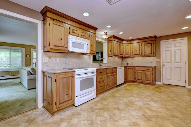 980 Mount Carmel Ave, Hamden, CT 06518 - kitchen featuring white appliances, a sink, recessed lighting, tasteful backsplash, and baseboards