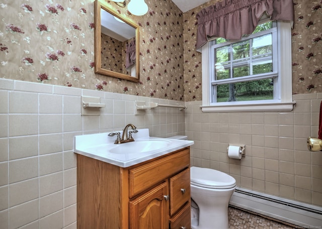 980 Mount Carmel Ave, Hamden, CT 06518 - bathroom featuring baseboard heating, wallpapered walls, vanity, a wainscoted wall, and toilet