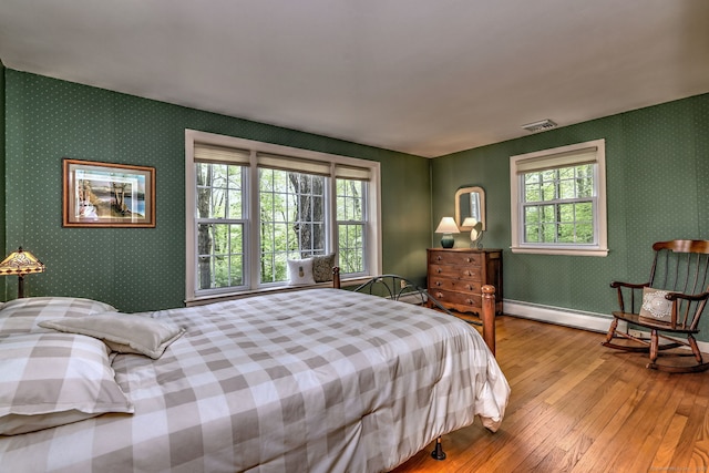 980 Mount Carmel Ave, Hamden, CT 06518 - bedroom with hardwood / wood-style floors