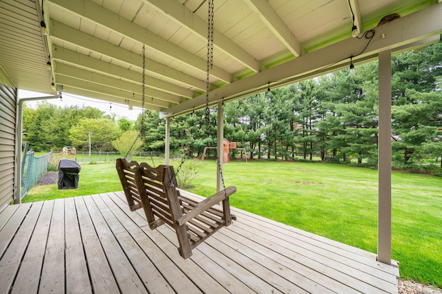 wooden deck featuring view of scattered trees
