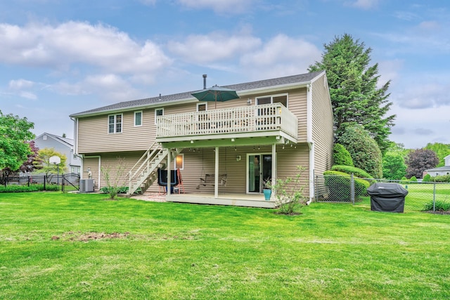 rear view of house featuring a deck, central AC unit, and stairway