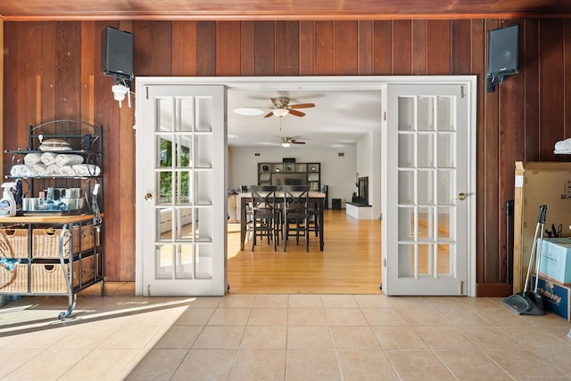 1 Penwood Rd, Bloomfield, CT 06002 - entryway with ceiling fan, tile patterned flooring, and wood walls
