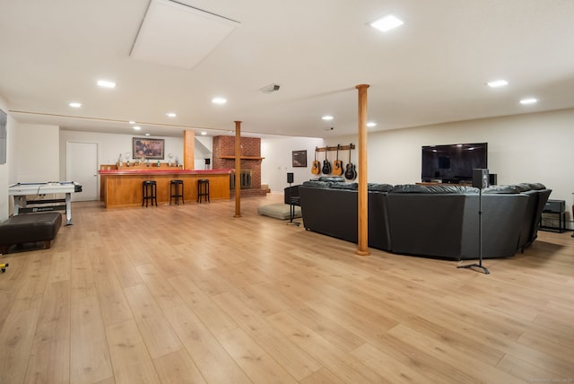1 Penwood Rd, Bloomfield, CT 06002 - living area with light wood-style floors, recessed lighting, and bar area