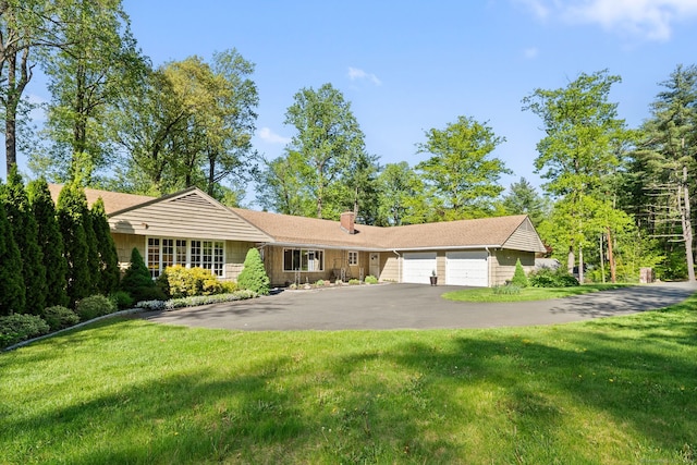 1 Penwood Rd, Bloomfield, CT 06002 - ranch-style home with a garage, asphalt driveway, a chimney, and a front lawn