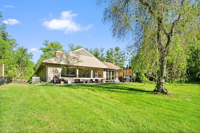1 Penwood Rd, Bloomfield, CT 06002 - back of house featuring a chimney and a patio area