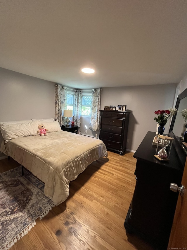 bedroom featuring light wood-type flooring