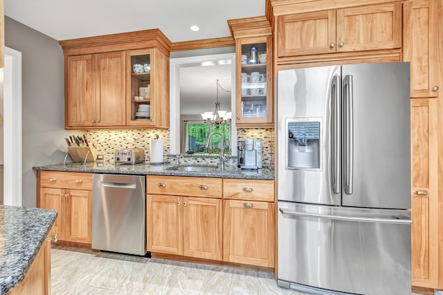 123 Old Belden Hill Rd Apt 41, Norwalk, CT 06850 - kitchen with stainless steel appliances, a sink, dark stone counters, tasteful backsplash, and recessed lighting