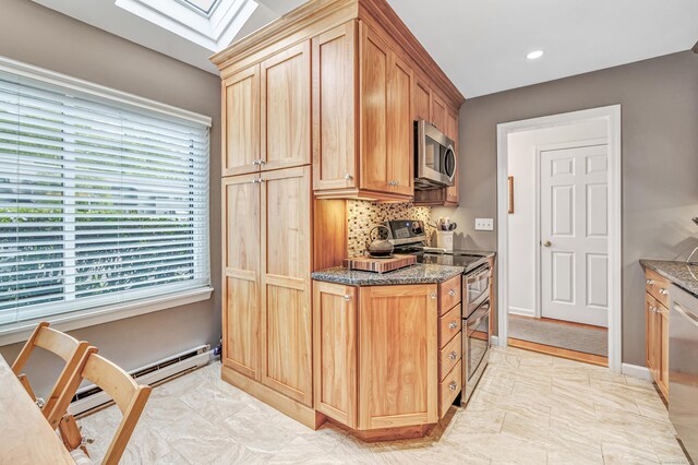123 Old Belden Hill Rd Apt 41, Norwalk, CT 06850 - kitchen featuring appliances with stainless steel finishes, dark stone counters, a skylight, tasteful backsplash, and recessed lighting