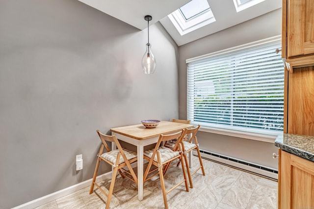 123 Old Belden Hill Rd Apt 41, Norwalk, CT 06850 - dining area with a skylight, baseboard heating, lofted ceiling, and baseboards