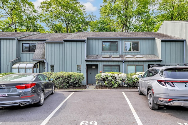 123 Old Belden Hill Rd Apt 41, Norwalk, CT 06850 - view of front facade featuring roof with shingles and uncovered parking