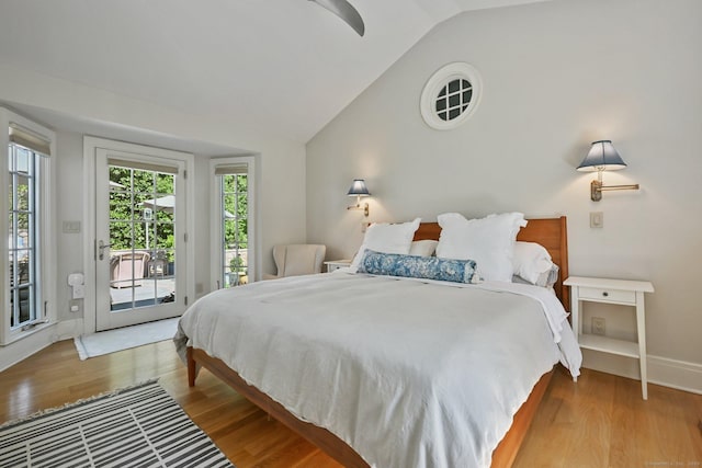 144 S Ave, New Canaan, CT 06840 - bedroom with access to exterior, wood finished floors, vaulted ceiling, and baseboards