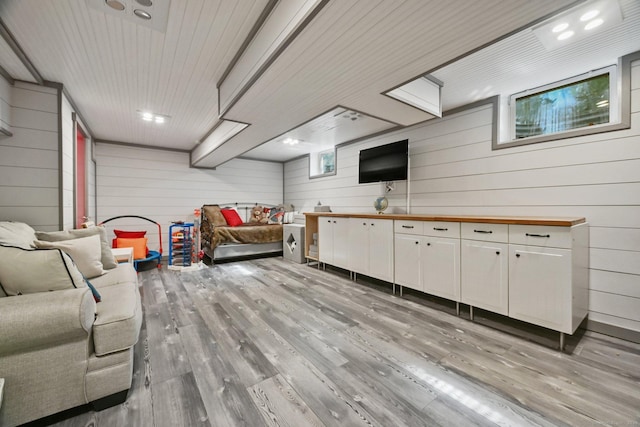 144 S Ave, New Canaan, CT 06840 - living room featuring wood walls and wood finished floors
