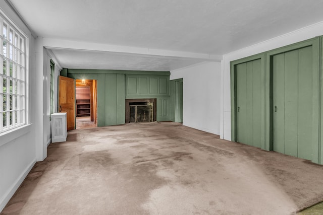 804 Forest Rd, North Branford, CT 06472 - unfurnished living room with a fireplace, carpet flooring, and baseboards