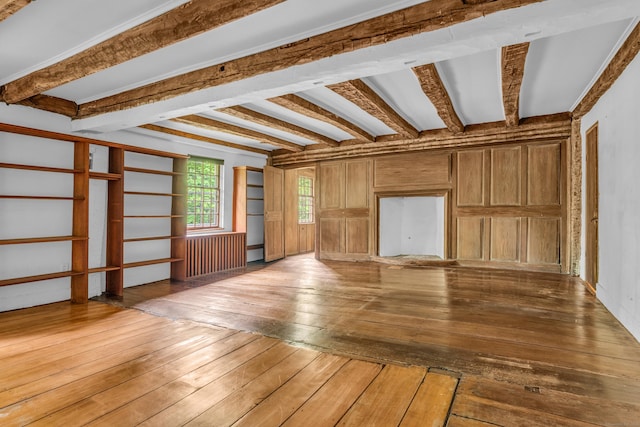 804 Forest Rd, North Branford, CT 06472 - unfurnished living room with hardwood / wood-style flooring and beam ceiling
