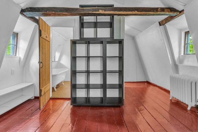 804 Forest Rd, North Branford, CT 06472 - interior space featuring radiator, wood finished floors, and beamed ceiling