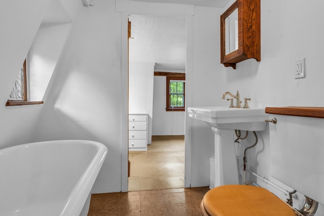 804 Forest Rd, North Branford, CT 06472 - full bath with a freestanding bath, toilet, and tile patterned floors