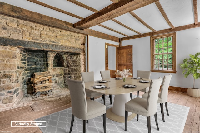 804 Forest Rd, North Branford, CT 06472 - dining area featuring hardwood / wood-style floors, beam ceiling, and baseboards