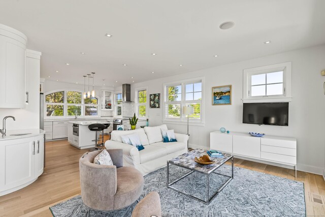 52 Old N Rd, Stonington, CT 06355 - living room featuring plenty of natural light, light wood-style floors, recessed lighting, and baseboards