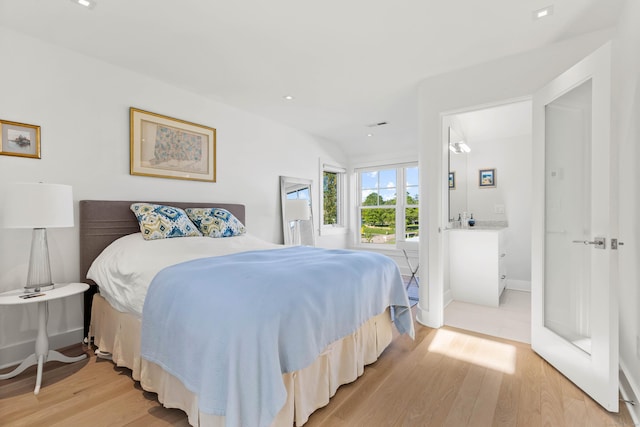 52 Old N Rd, Stonington, CT 06355 - bedroom with light wood-type flooring, recessed lighting, and baseboards
