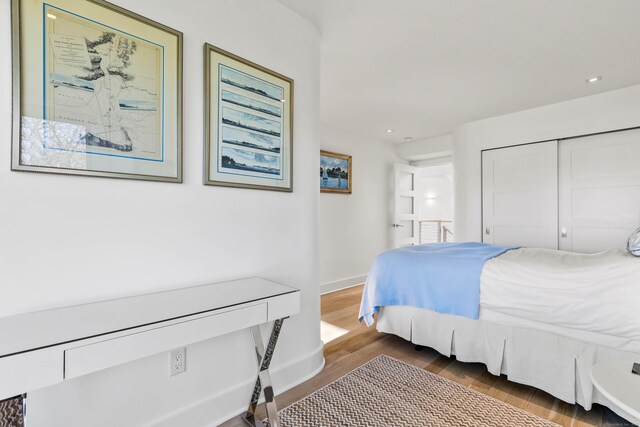 52 Old N Rd, Stonington, CT 06355 - bedroom with wood finished floors, baseboards, and a closet