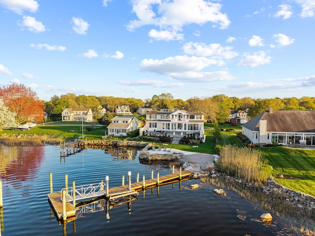 52 Old N Rd, Stonington, CT 06355 - dock area with a water view and a lawn