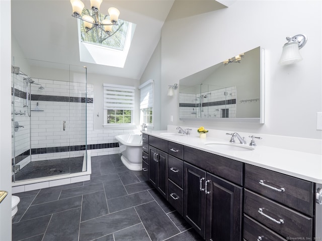 30 Wilton Hunt Rd Unit 30, Wilton, CT 06897 - full bath featuring vaulted ceiling, a chandelier, a shower stall, a skylight, and a freestanding bath