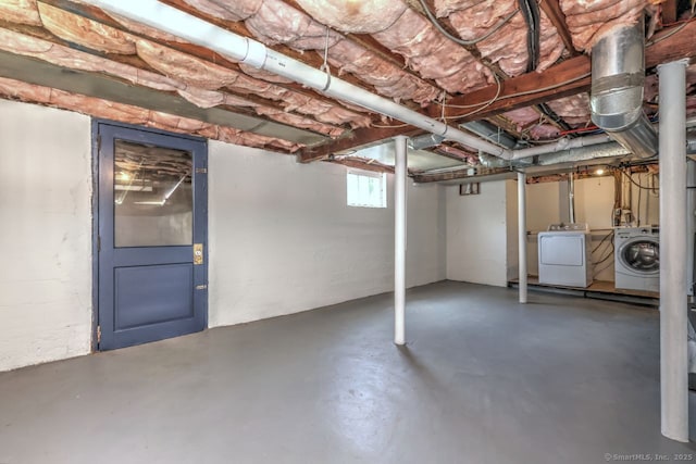 below grade area featuring washing machine and dryer