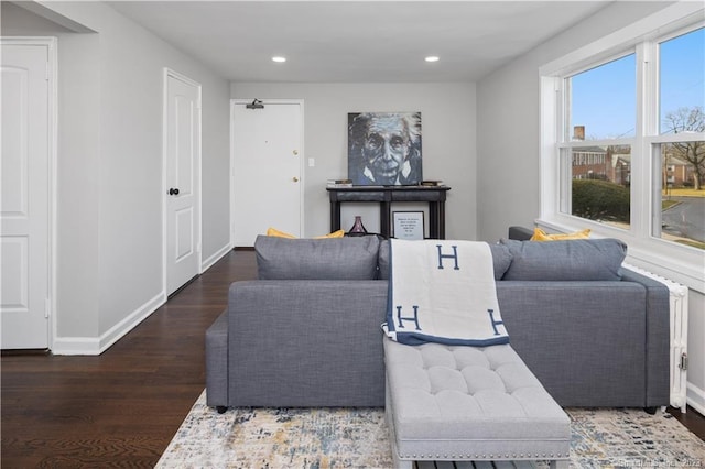 living area featuring wood finished floors, recessed lighting, and baseboards