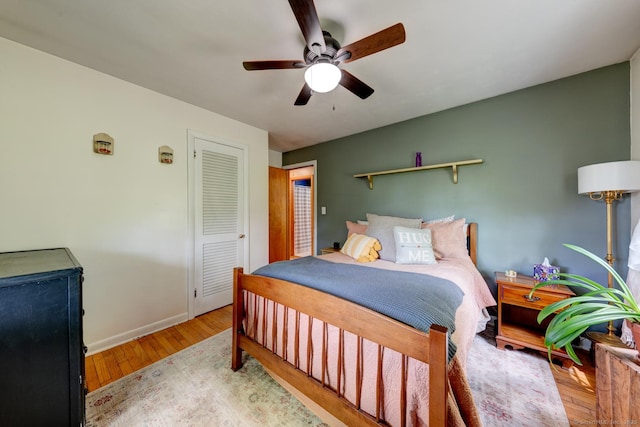7 Parker Rd, Willington, CT 06279 - bedroom featuring wood finished floors, baseboards, a closet, and a ceiling fan