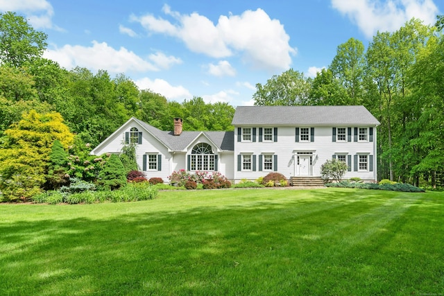 6 Galilee Way, Newtown, CT 06470 - colonial home with a front yard and a chimney