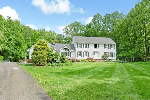 6 Galilee Way, Newtown, CT 06470 - colonial home with a front yard and a chimney