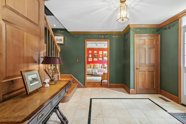 6 Galilee Way, Newtown, CT 06470 - entryway featuring baseboards, crown molding, stairway, and a chandelier