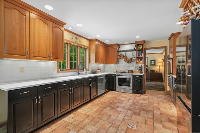 6 Galilee Way, Newtown, CT 06470 - kitchen with stainless steel appliances, light countertops, decorative backsplash, a sink, and recessed lighting