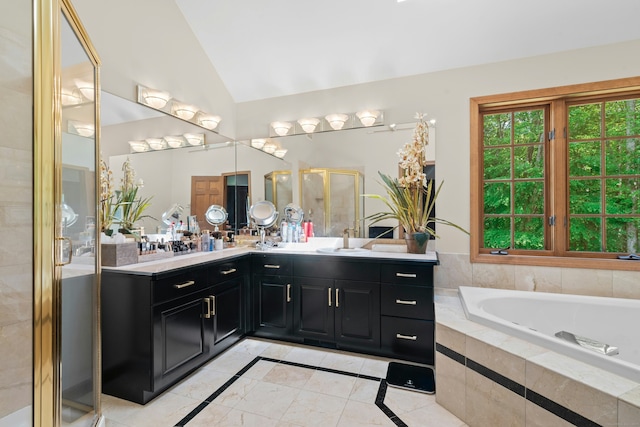6 Galilee Way, Newtown, CT 06470 - bathroom featuring double vanity, lofted ceiling, a garden tub, a shower stall, and inlaid floor details