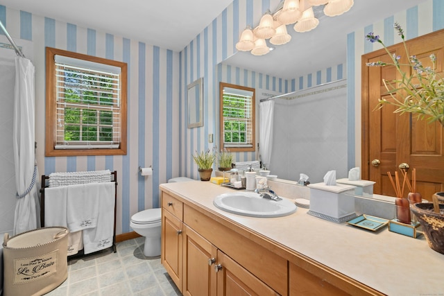 6 Galilee Way, Newtown, CT 06470 - bathroom with vanity, toilet, a shower with shower curtain, wallpapered walls, and a chandelier