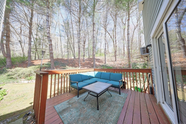 wooden terrace featuring an outdoor hangout area