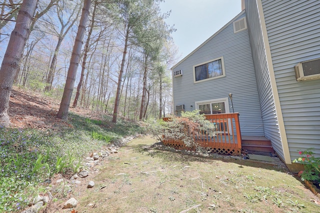 view of yard with a deck