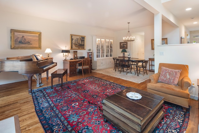 44 Hale Ln, Darien, CT 06820 - living area featuring wood finished floors, a chandelier, recessed lighting, and baseboards