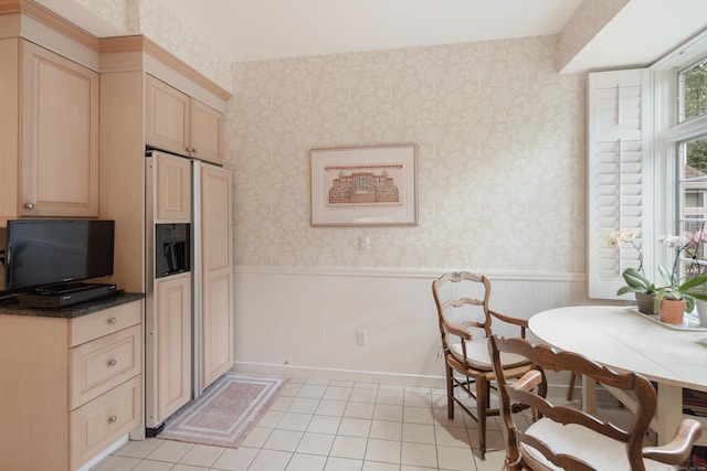 44 Hale Ln, Darien, CT 06820 - kitchen featuring a wainscoted wall, light tile patterned flooring, paneled fridge, light brown cabinetry, and wallpapered walls