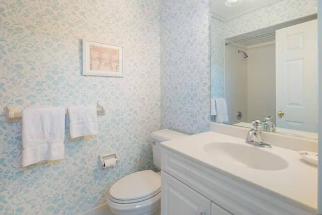 44 Hale Ln, Darien, CT 06820 - bathroom featuring wallpapered walls, vanity, and toilet