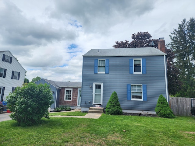 12 Flyers Dr, Norwich, CT 06360 - view of front of home featuring a chimney