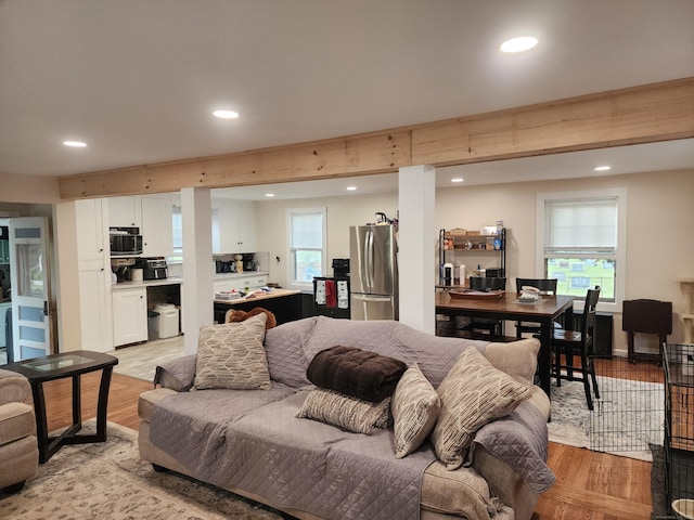 12 Flyers Dr, Norwich, CT 06360 - living room with light wood finished floors and recessed lighting