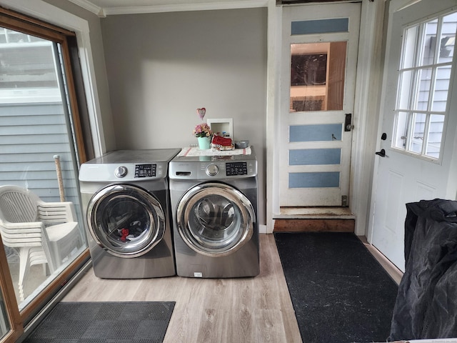 12 Flyers Dr, Norwich, CT 06360 - laundry room featuring independent washer and dryer, crown molding, and wood finished floors