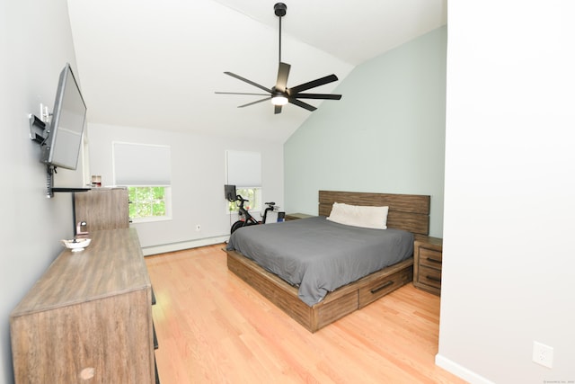 bedroom featuring lofted ceiling, a baseboard heating unit, light wood-type flooring, and ceiling fan