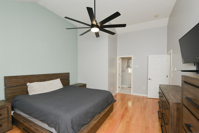 bedroom with light wood-type flooring, high vaulted ceiling, baseboards, and a ceiling fan