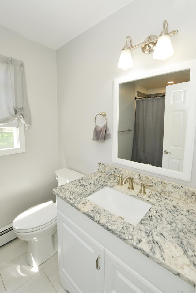 full bathroom with toilet, vanity, tile patterned flooring, and baseboard heating