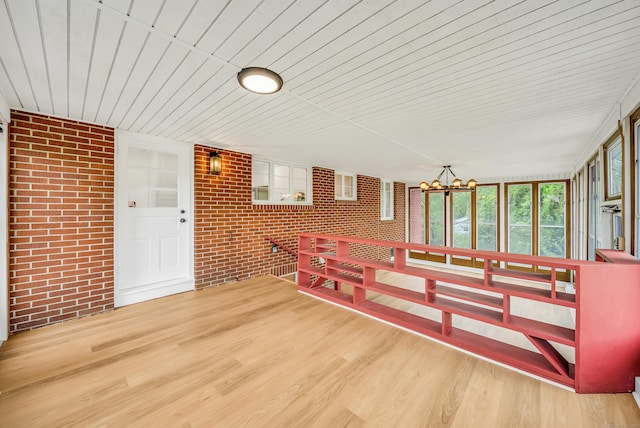636 Thompson Rd, Thompson, CT 06277 - unfurnished sunroom with a chandelier